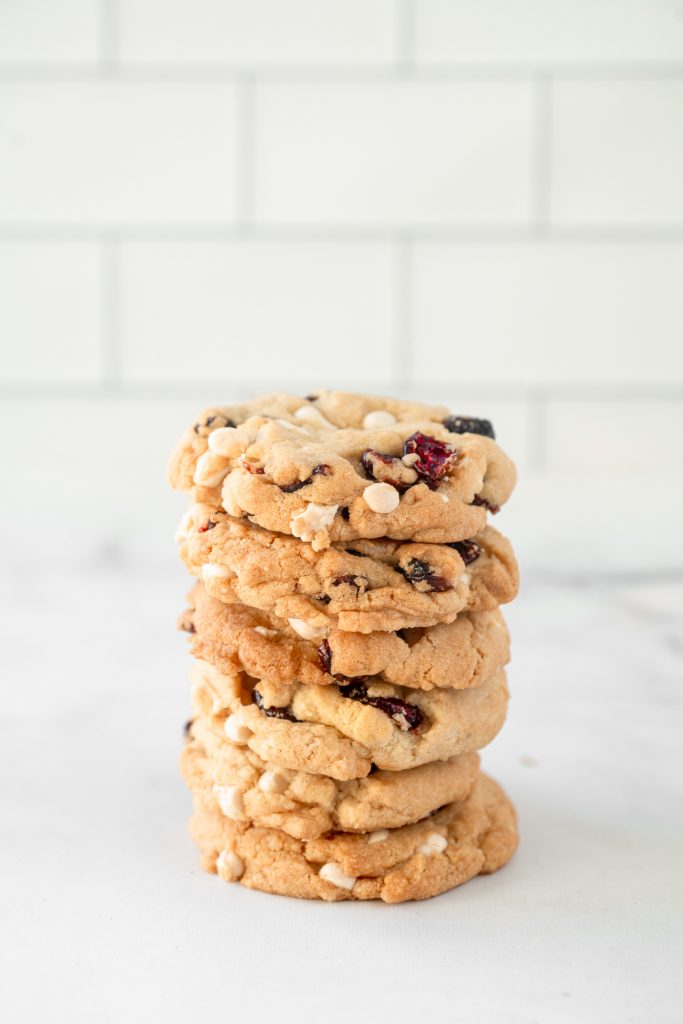 vegan white chocolate cranberry cookies stacked