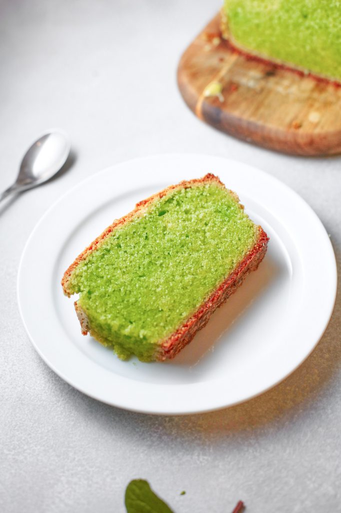 close up of a slice of moist vegan matcha pound cake