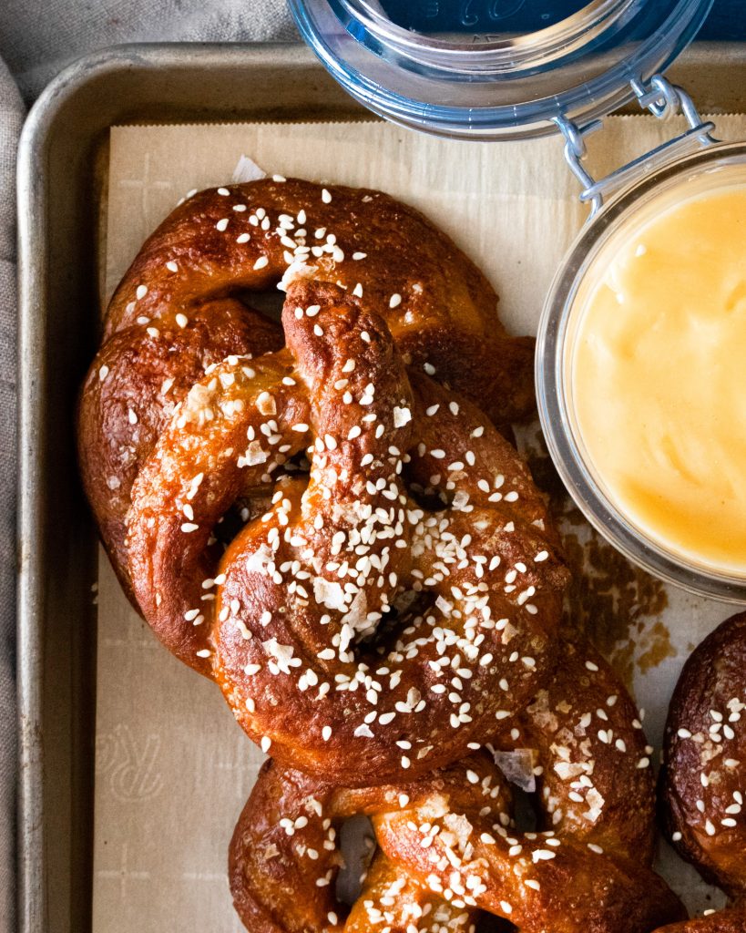 photo of vegan beer cheese dip on a serving tray