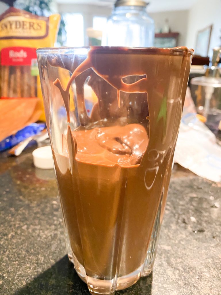 dark chocolate melted in a glass for dipping