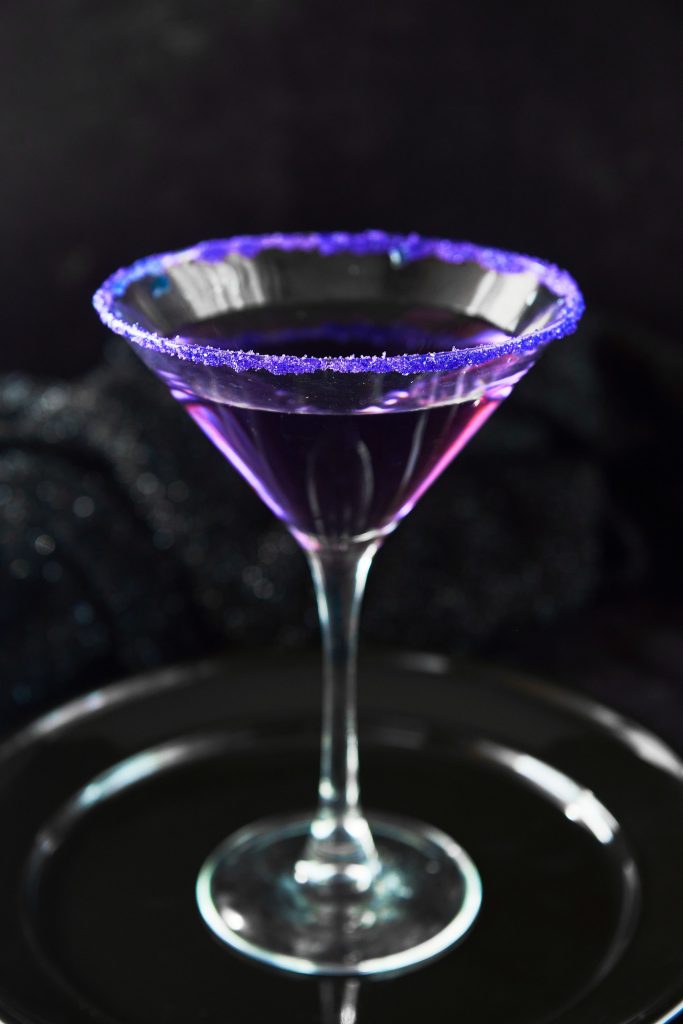Purple people eater halloween cocktail in glass