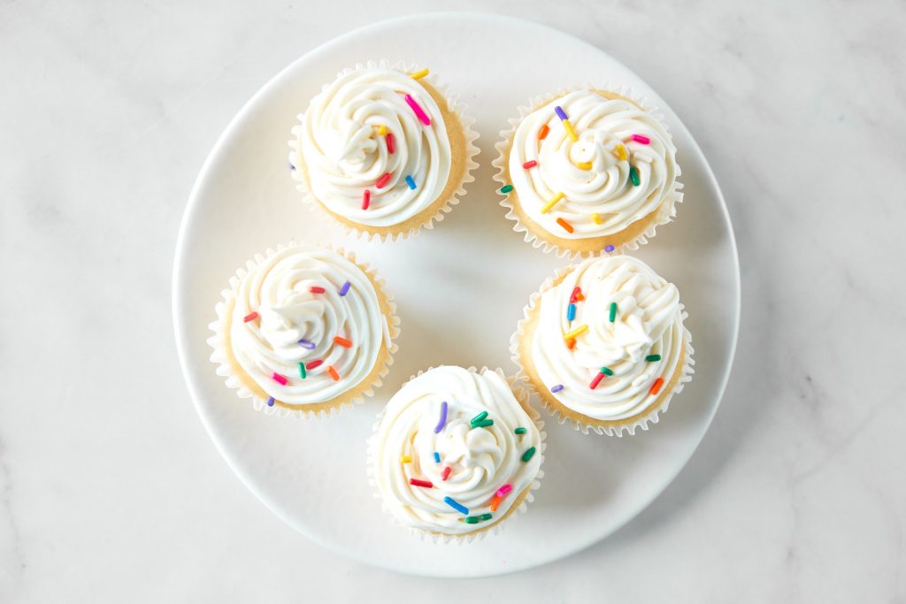 vegan vanilla cupcakes with sprinkles from above