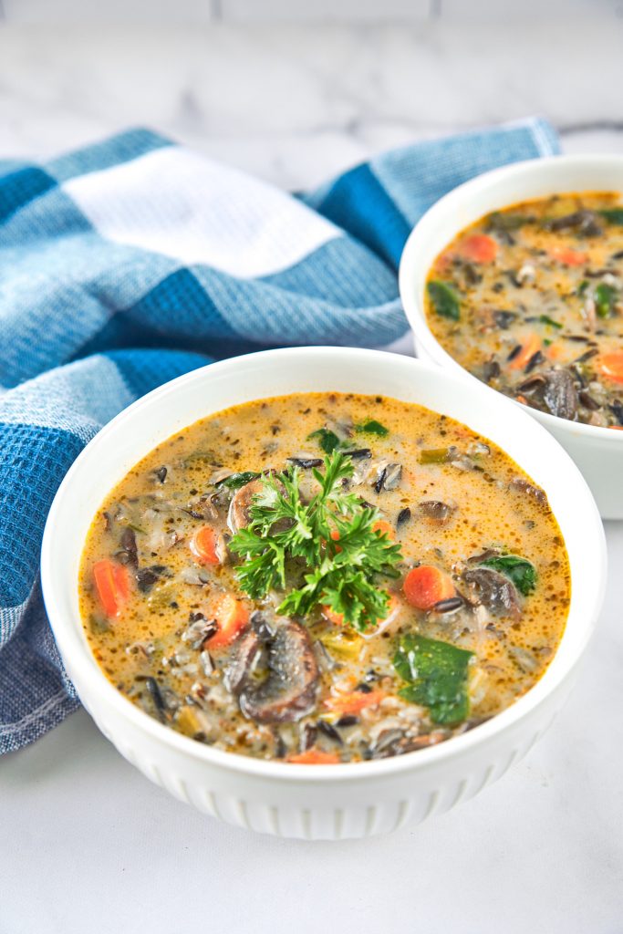 bowl of vegan wild rice soup with parsley 
