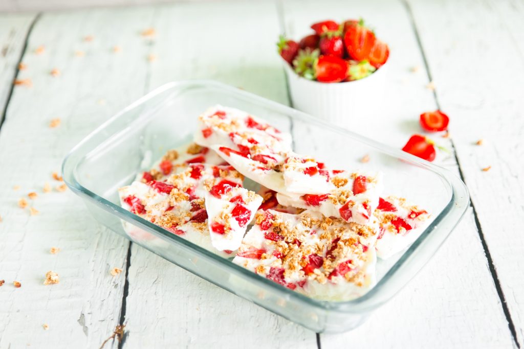 storing frozen yogurt bark in a freezer safe container