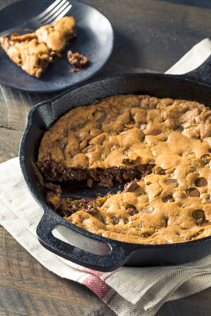 slice cut out of a vegan cookie cake