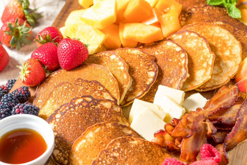 close up on pancakes on a breakfast board