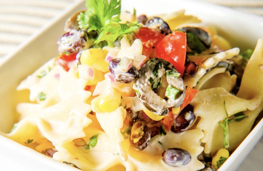 close up on mexican street corn pasta salad in a bowl