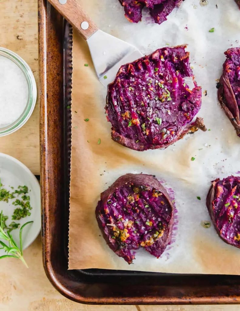 photo of a tray of roasted purple sweet potatoes 