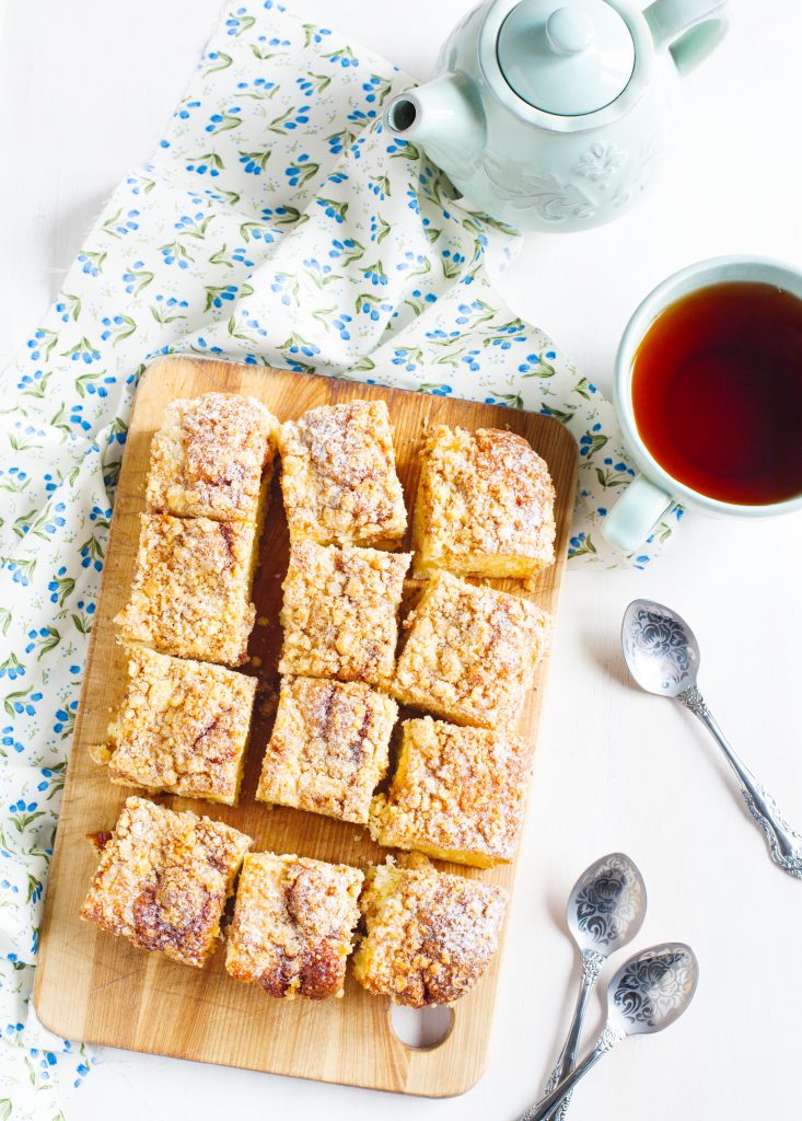 vegan coffee cake from above with serving spoons