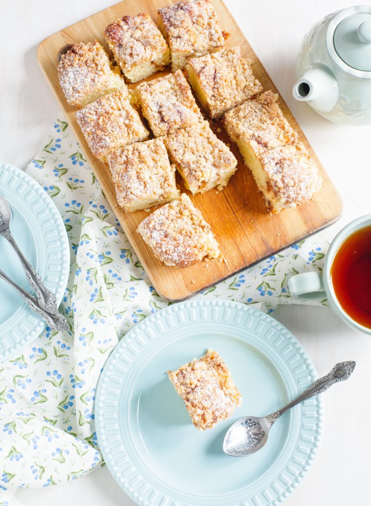 vegan coffee cake cut up on a serving board