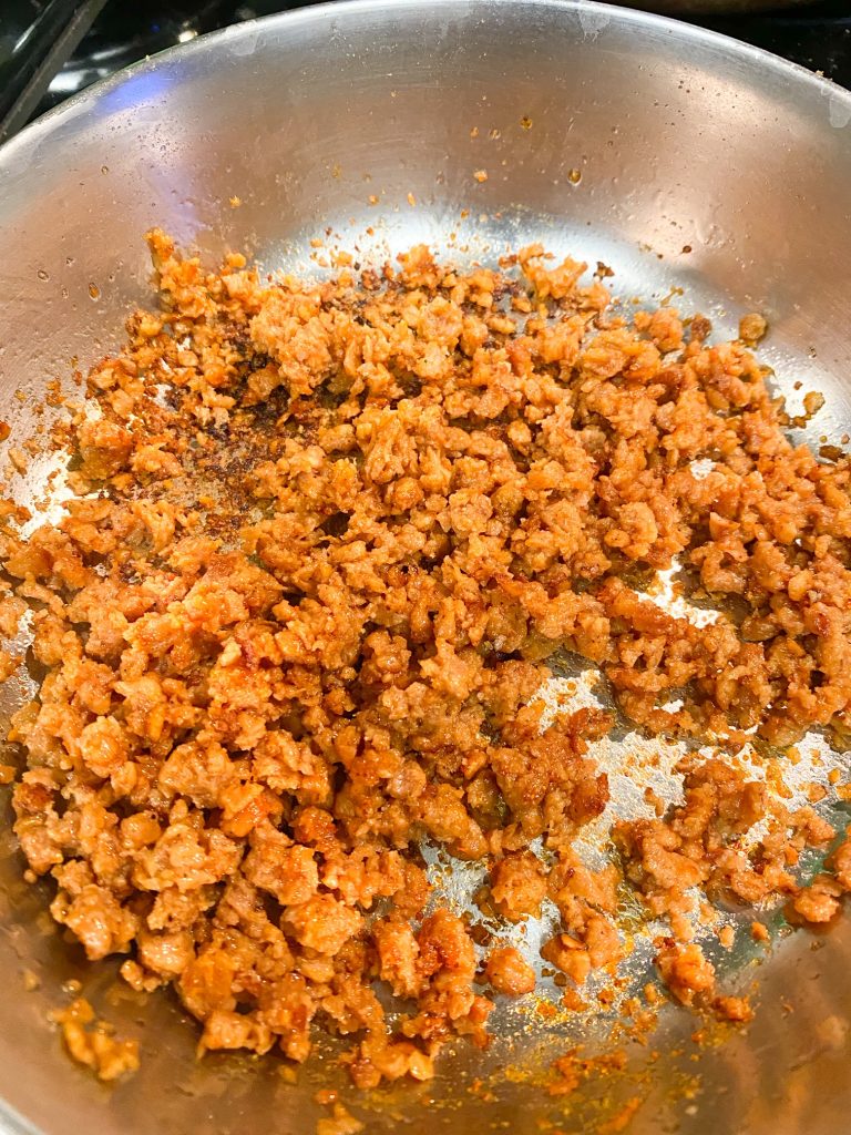 cooking vegan beef crumbles on a plate