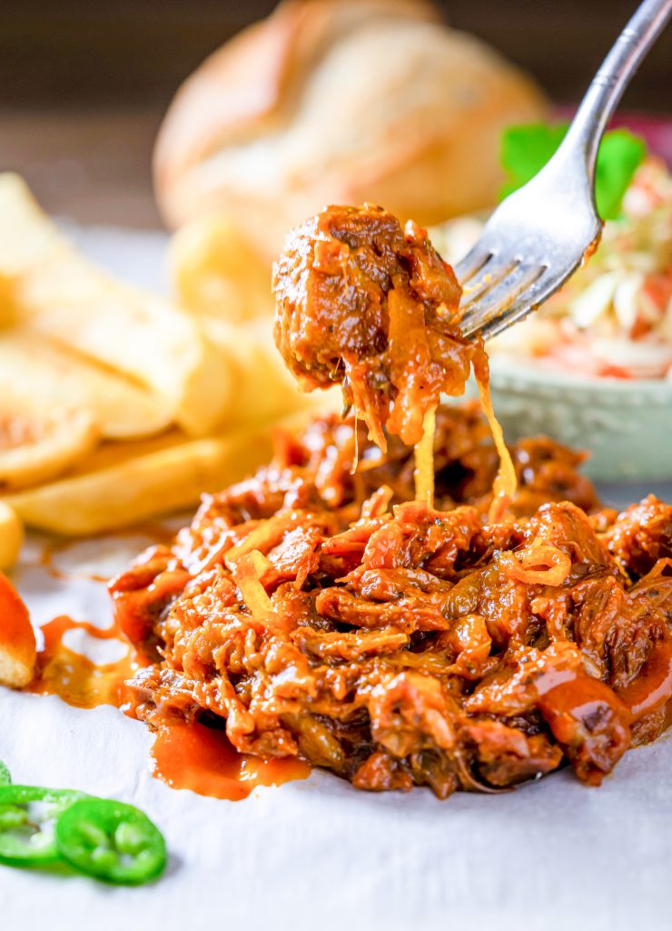 jackfruit pulled pork with a fork picking it up