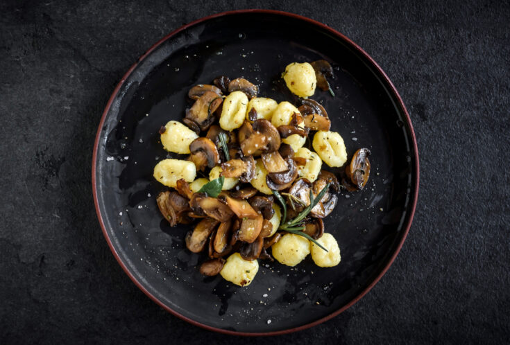 vegan gnocchi with mushrooms on a plate