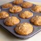 apple walnut muffins in muffin tin