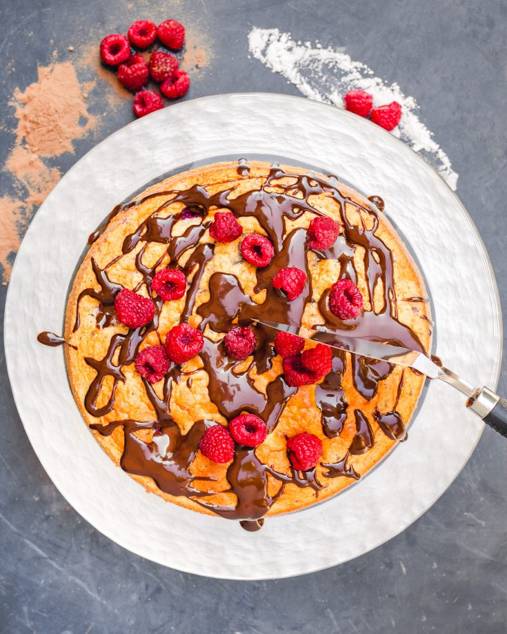 chocolate raspberry cake on stand