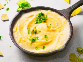 vegan queso recipe in cast iron skillet