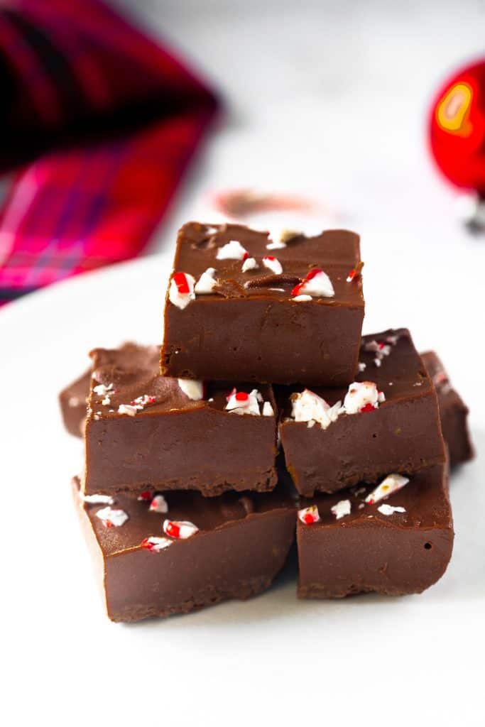 Chocolate peppermint fudge with crushed candy canes on top.