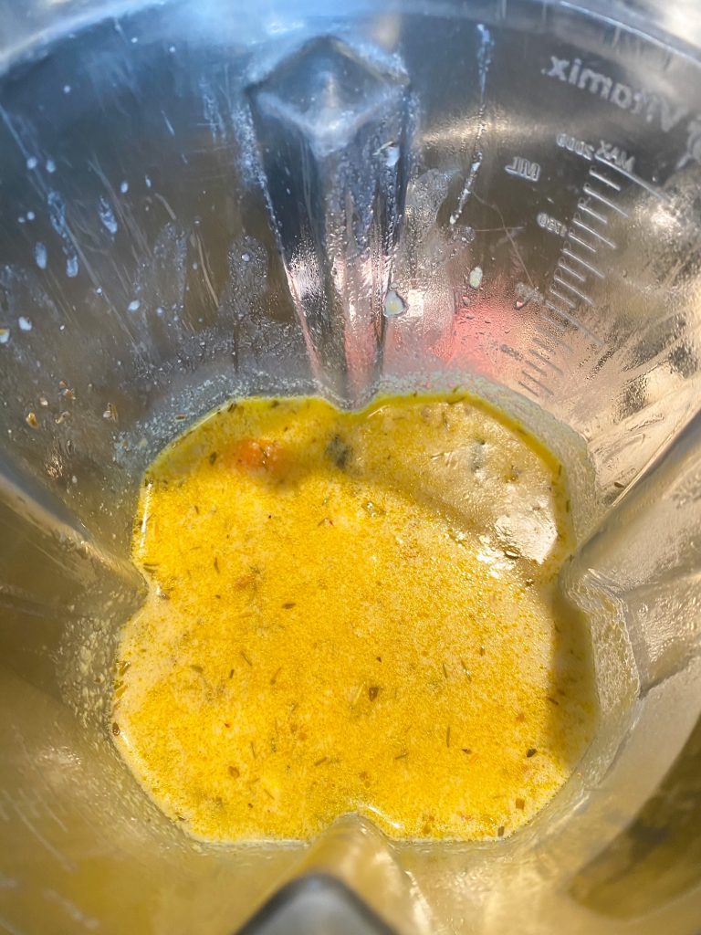 Carrot broth in a blender.