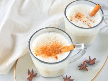 two cups of vegan chai latte that uses a starbucks copycat recipe