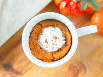 vegan pumpkin mug cake with whipped cream