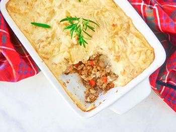 vegan shepherd's pie in a casserole dish with lentils