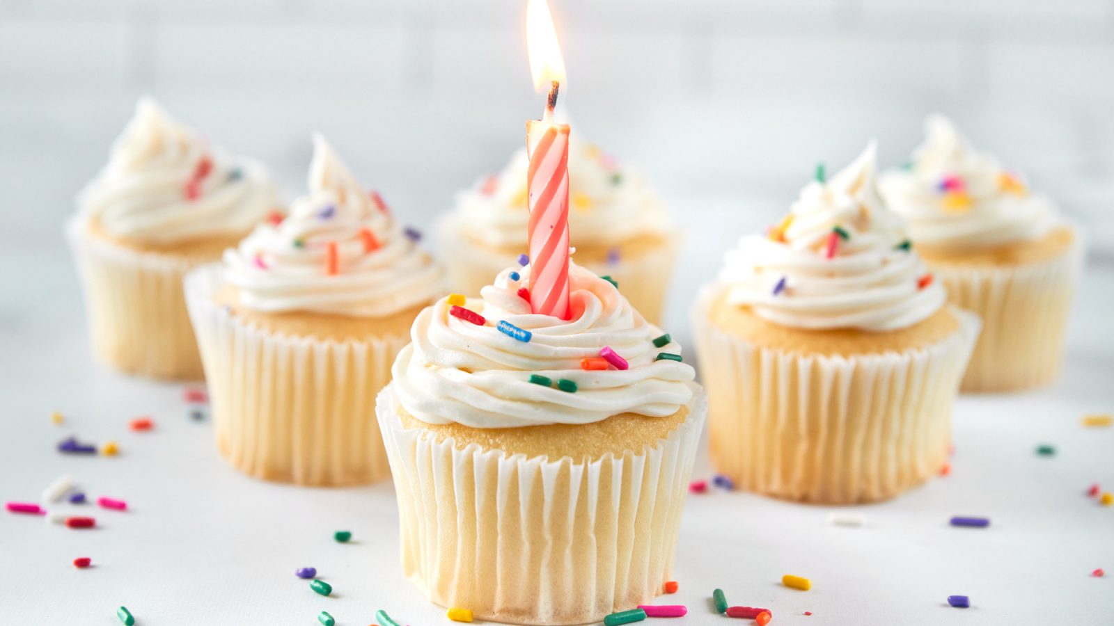 vegan vanilla cupcakes with a birthday candle