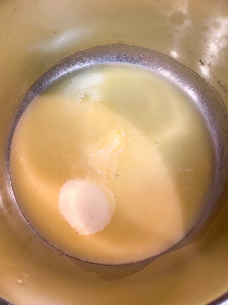 Vegan butter melting in a pot.