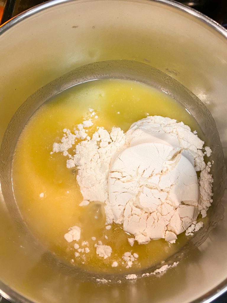 Flour unmixed on top of vegan butter.