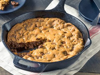 vegan skillet cookie being made in a cast iron pan