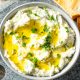 fresh herbed goat cheese dip in a bowl