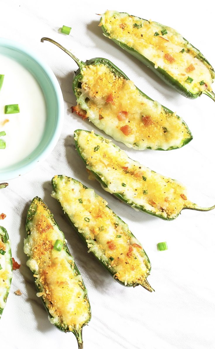 vegan jalapeno poppers with vegan bacon and vegan sour cream