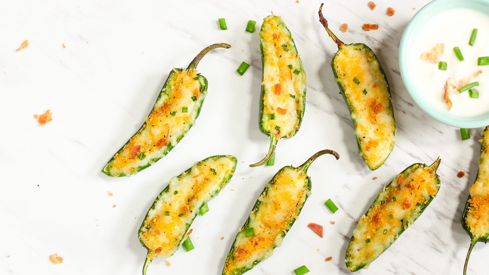 vegan jalapeno poppers on a white counter top