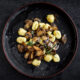vegan gnocchi with mushrooms on a plate