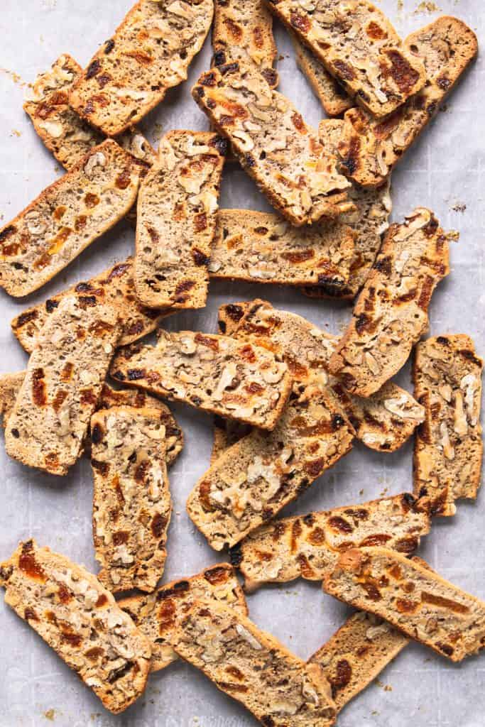 Pile of Vegan Biscotti on parchment paper.